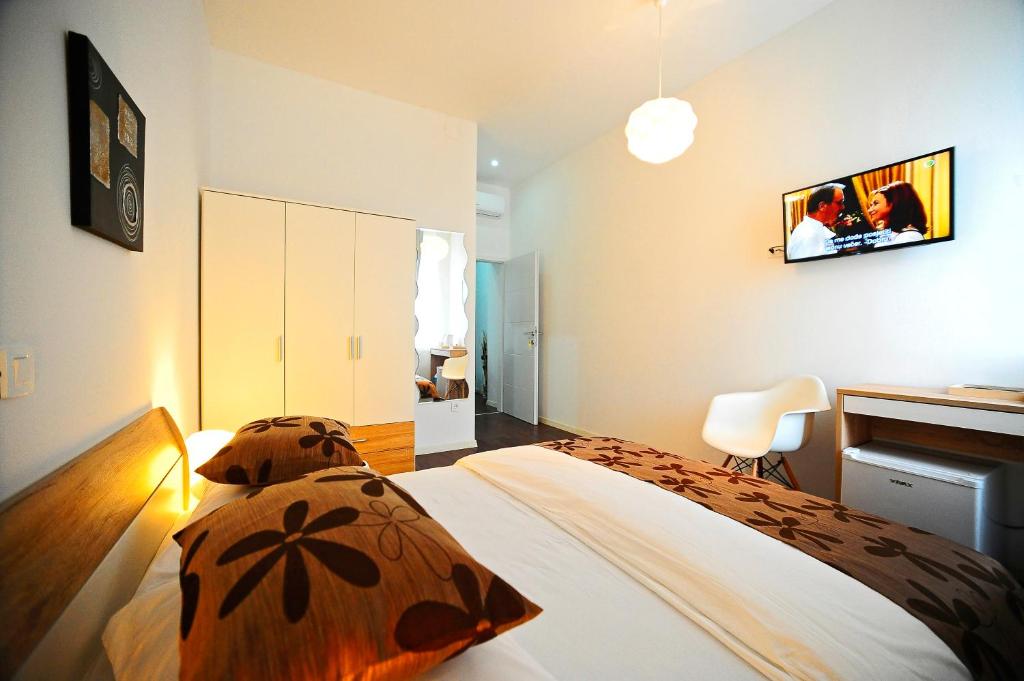 Postel nebo postele na pokoji v ubytování Valenti rooms