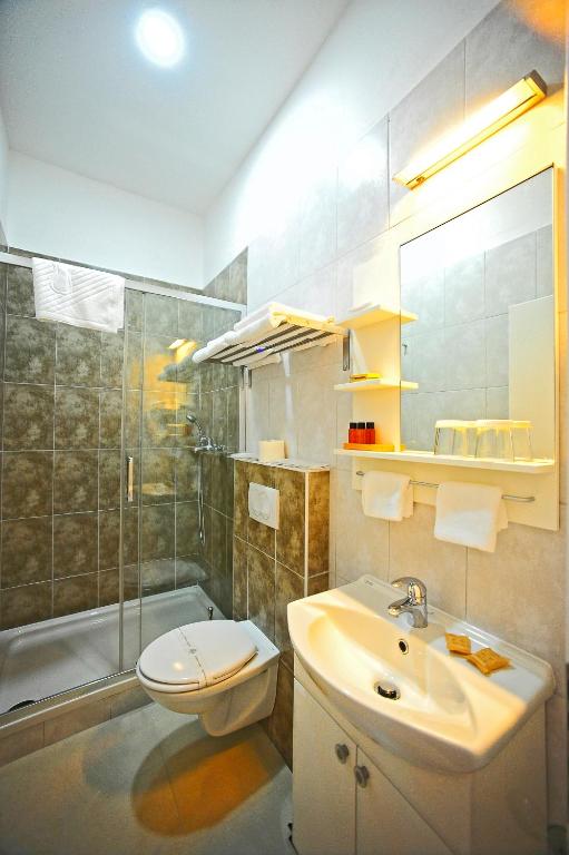 Koupelna v ubytování Valenti rooms
