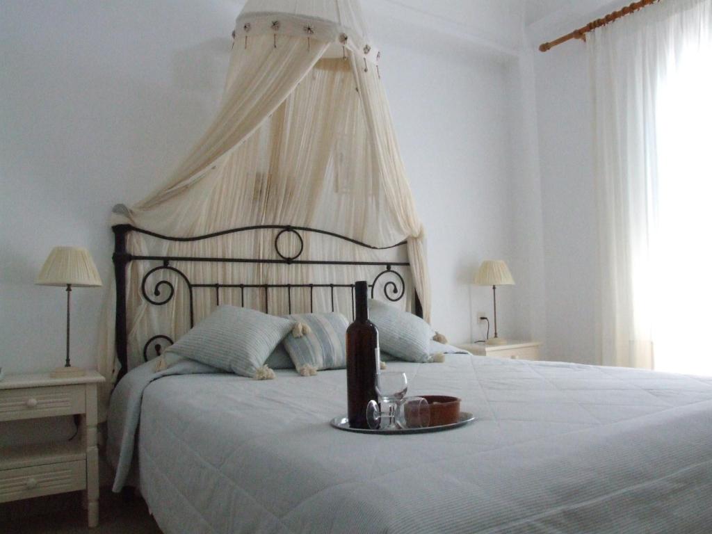 Een bed of bedden in een kamer bij Hotel Matina