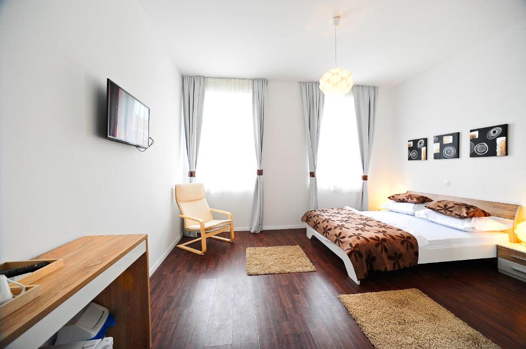 Postel nebo postele na pokoji v ubytování Valenti rooms