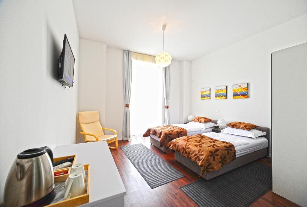 Postel nebo postele na pokoji v ubytování Valenti rooms
