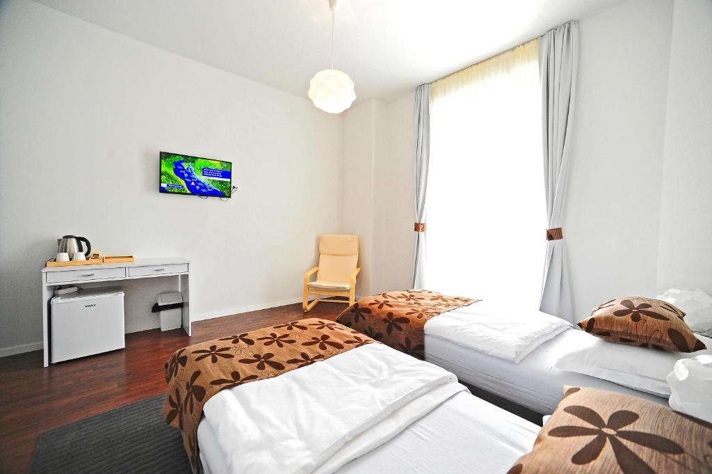 Postel nebo postele na pokoji v ubytování Valenti rooms