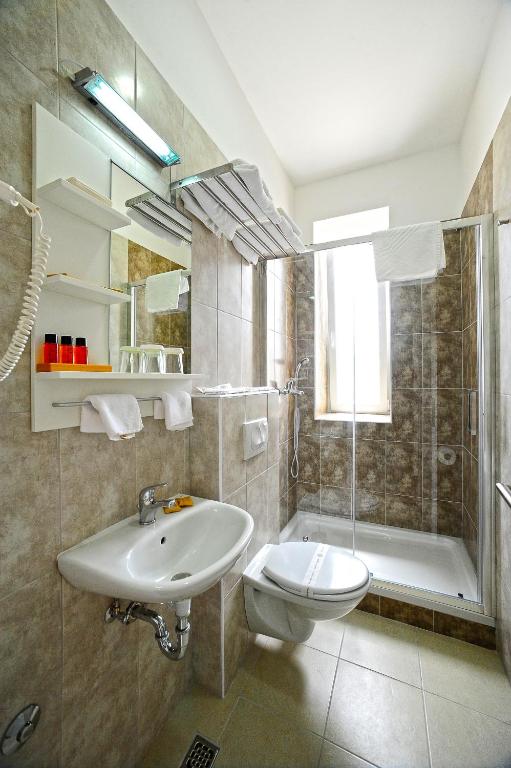 Koupelna v ubytování Valenti rooms
