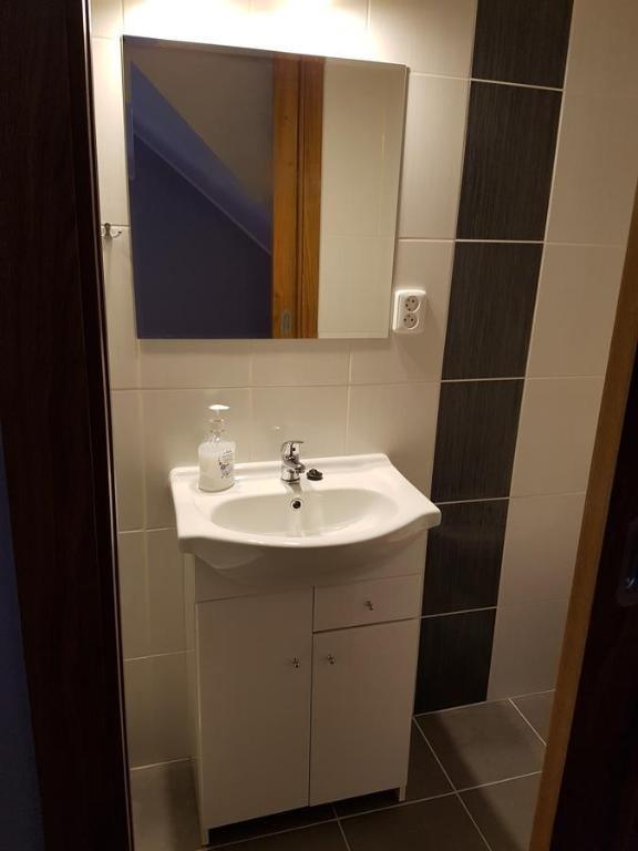 Koupelna v ubytování Restaurace & Penzion U Tří Jasanů