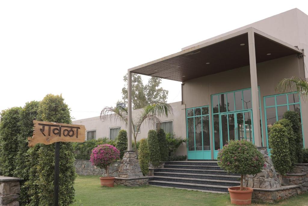 a building with a sign in front of it at Balaji Seven Hills in Jaipur