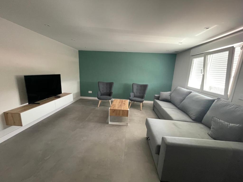 TV a/nebo společenská místnost v ubytování La casita de Pepa