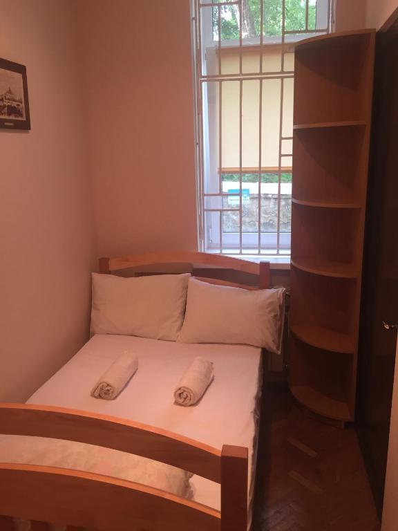 Postel nebo postele na pokoji v ubytování Globus Hostel