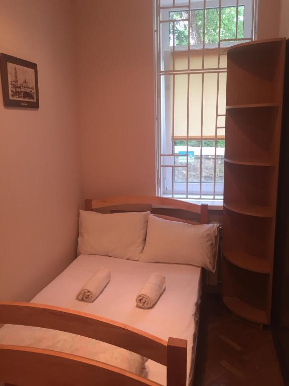 Postel nebo postele na pokoji v ubytování Globus Hostel