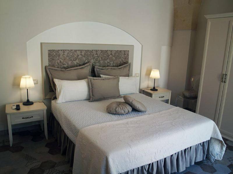 Postel nebo postele na pokoji v ubytování Sine Tempore B&B
