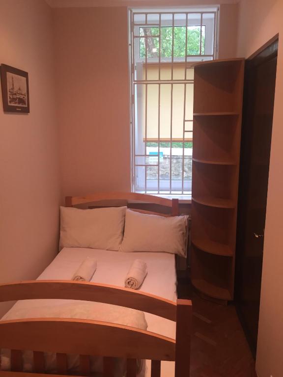 Postel nebo postele na pokoji v ubytování Globus Hostel