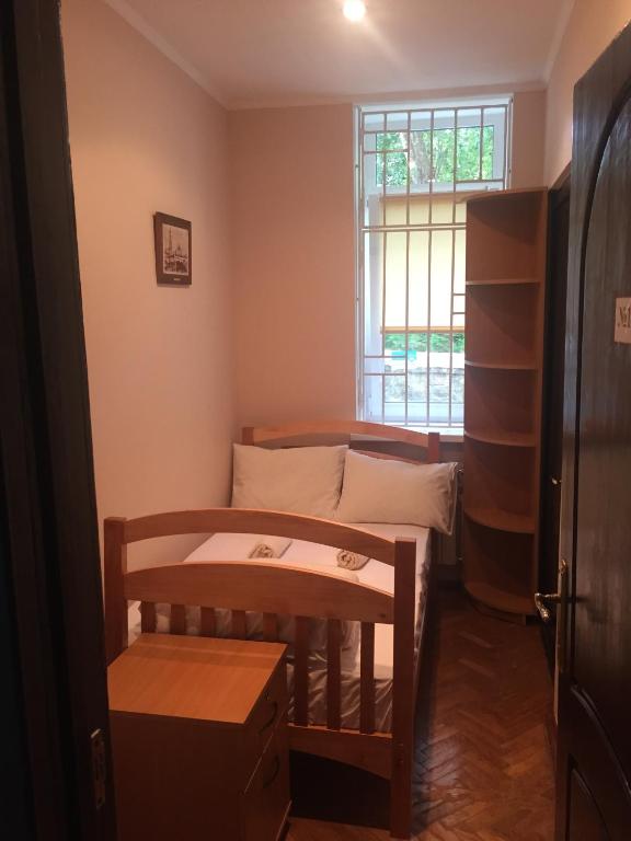 Postel nebo postele na pokoji v ubytování Globus Hostel