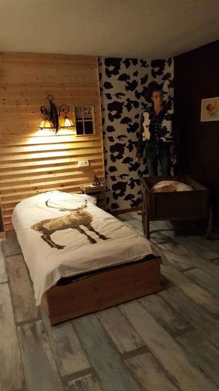 Postel nebo postele na pokoji v ubytování le gite de zoelie
