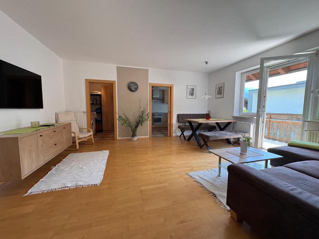 a living room with a couch and a table at Apartment Apfel in Naturno