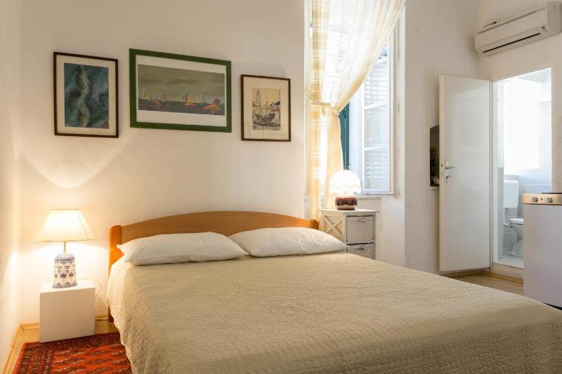 Posteľ alebo postele v izbe v ubytovaní Old Town Port Apartments
