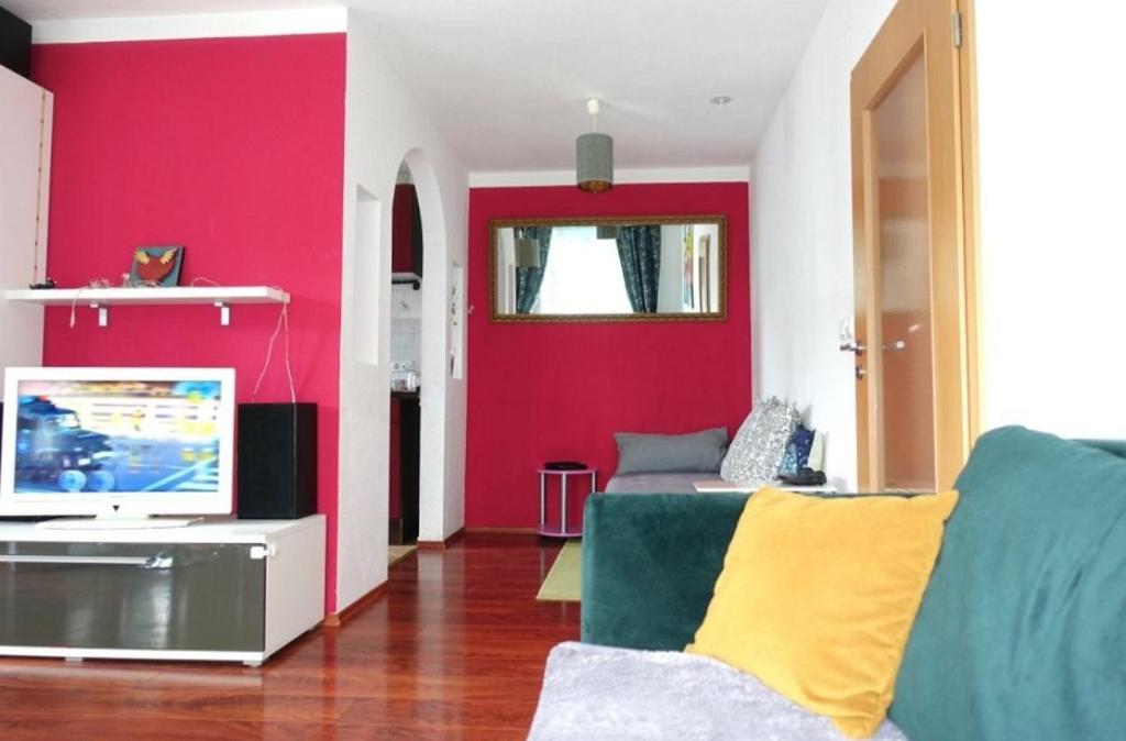 Televisyen dan/atau pusat hiburan di Top Apartment in Langenhagen