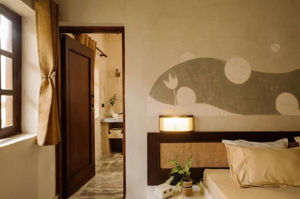 Postel nebo postele na pokoji v ubytování Project LIARISE