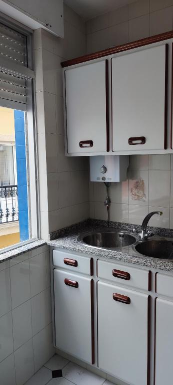 Kuchyň nebo kuchyňský kout v ubytování Casa Azul Corme Porto