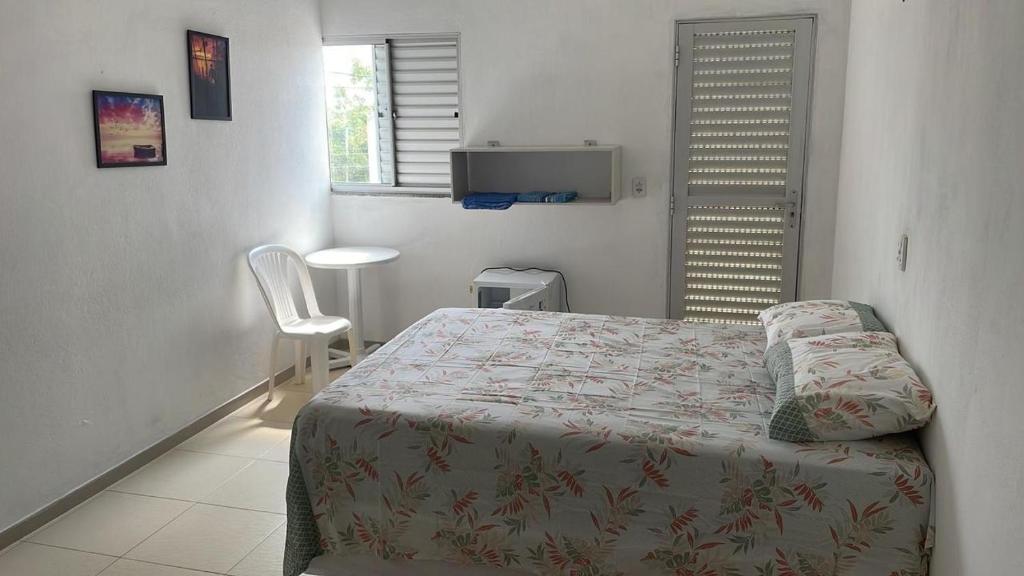 Ένα ή περισσότερα κρεβάτια σε δωμάτιο στο Pousada Recanto Bella Vista