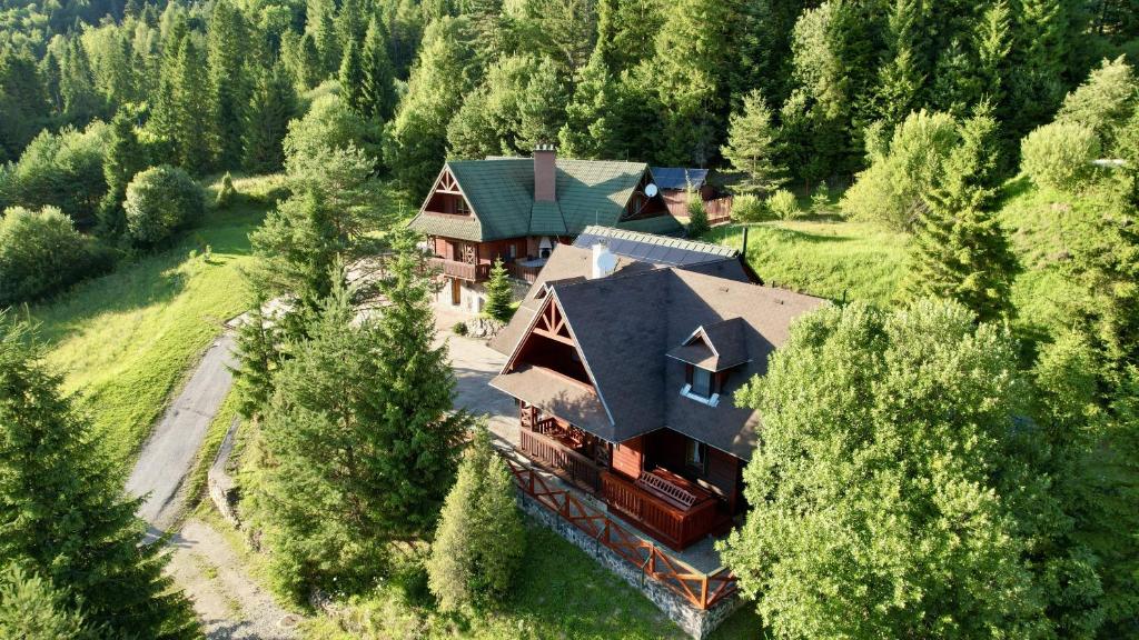 an overhead view of a large house in the forest at Chata Brusnica in Litmanová