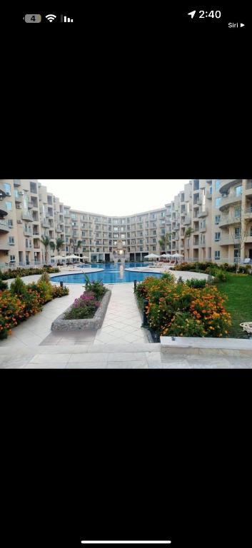 a picture of a large apartment building with a courtyard at منتجع البرنسيسه Princess Resort Hurghada in Hurghada