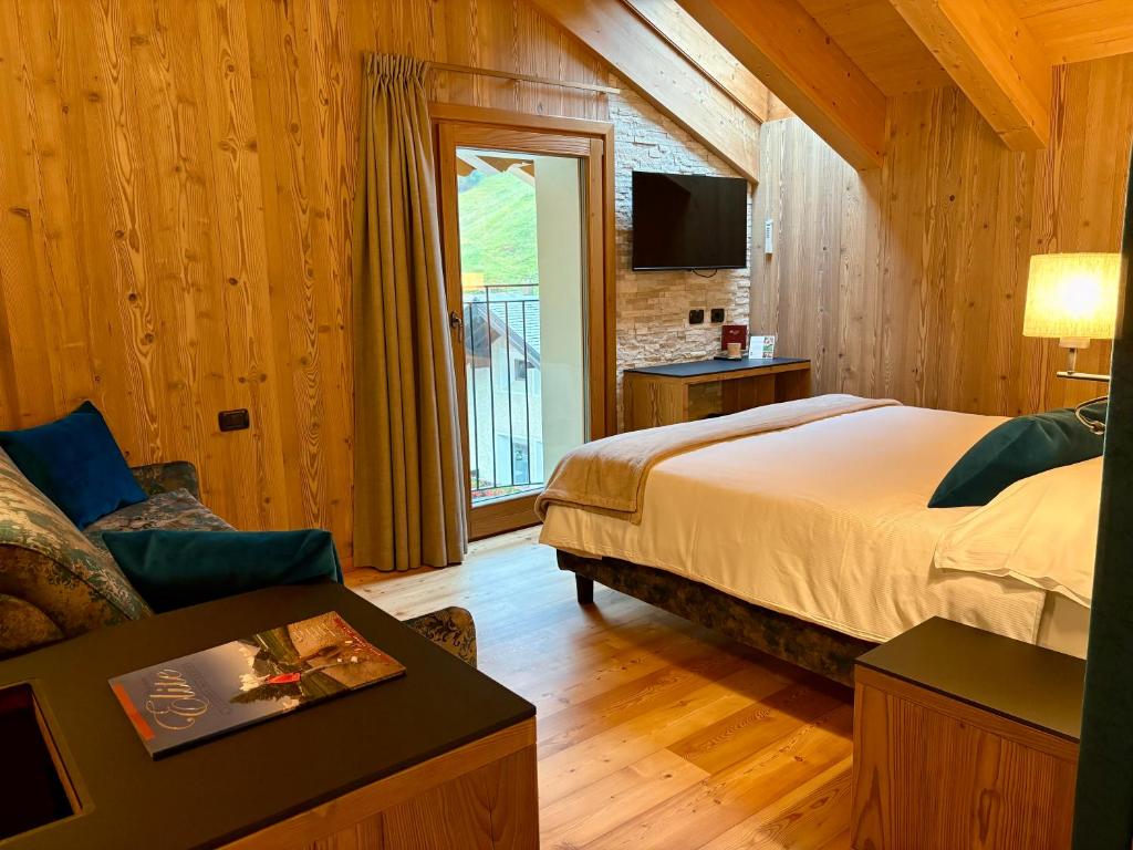 Voodi või voodid majutusasutuse Hotel Pedranzini toas