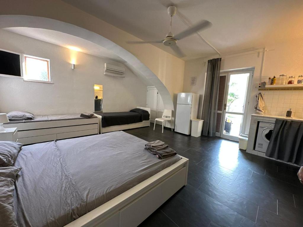 A bed or beds in a room at Casa Luvi