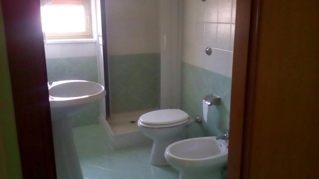 Koupelna v ubytování B&b La Scogliera