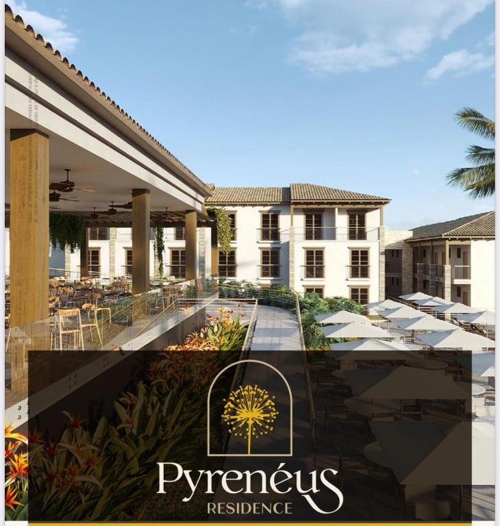 a sign for a resort with a patio with tables and umbrellas at Pyrenéus Residence in Pirenópolis