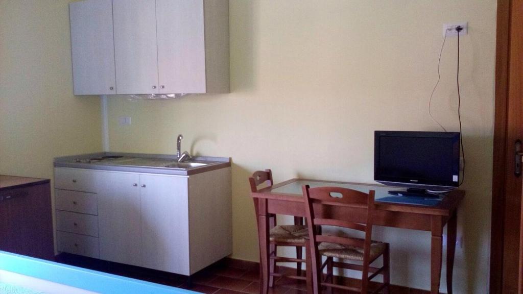 Kuchyň nebo kuchyňský kout v ubytování B&b La Scogliera