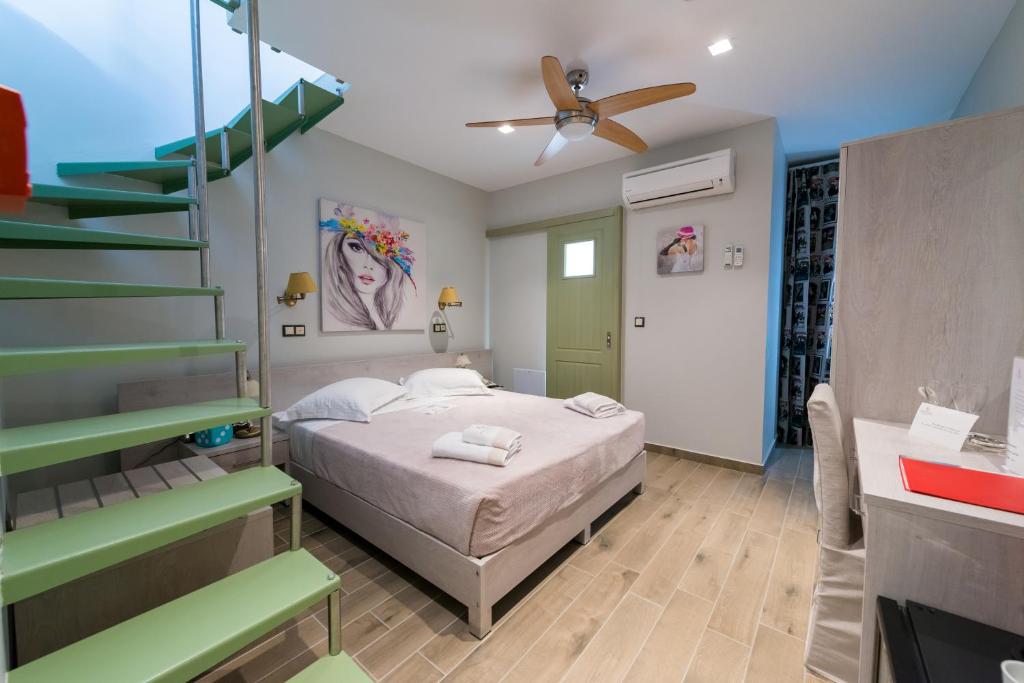 Postel nebo postele na pokoji v ubytování Fiscardonna Luxury Suites