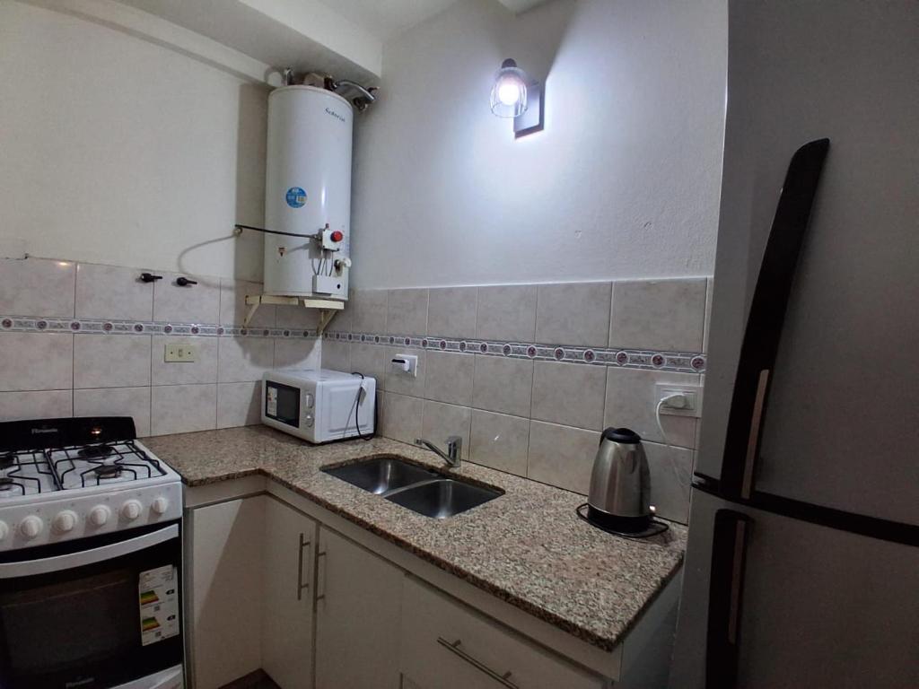 Kuchyň nebo kuchyňský kout v ubytování Belgrano 363