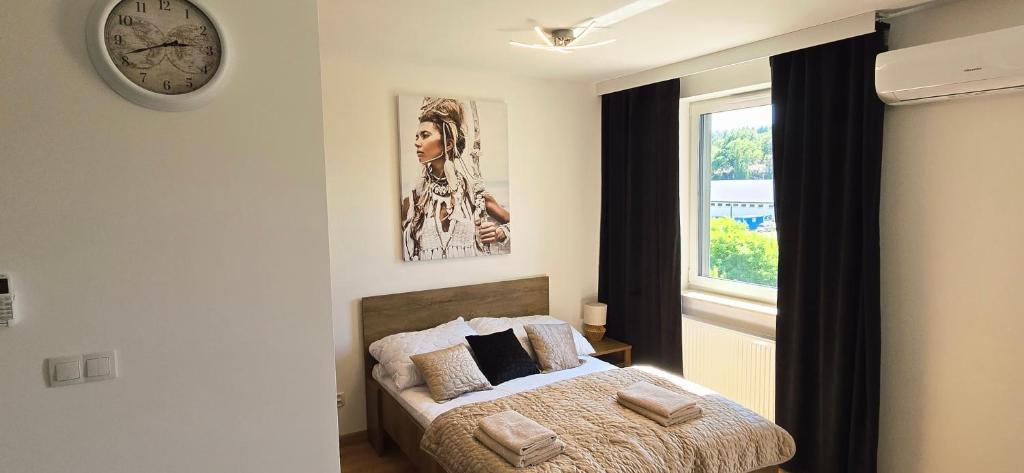 Ένα ή περισσότερα κρεβάτια σε δωμάτιο στο Apartment Lila 68