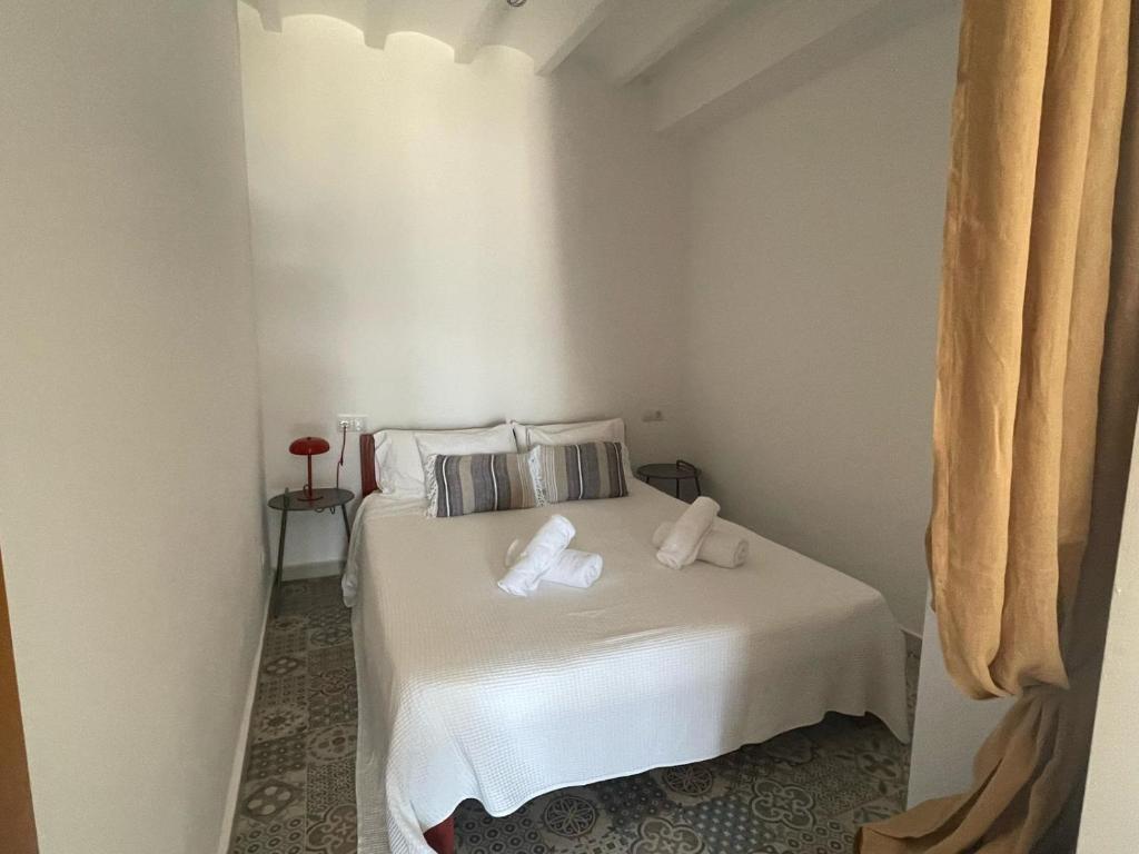 En eller flere senge i et værelse på H&B COSTABLANCA