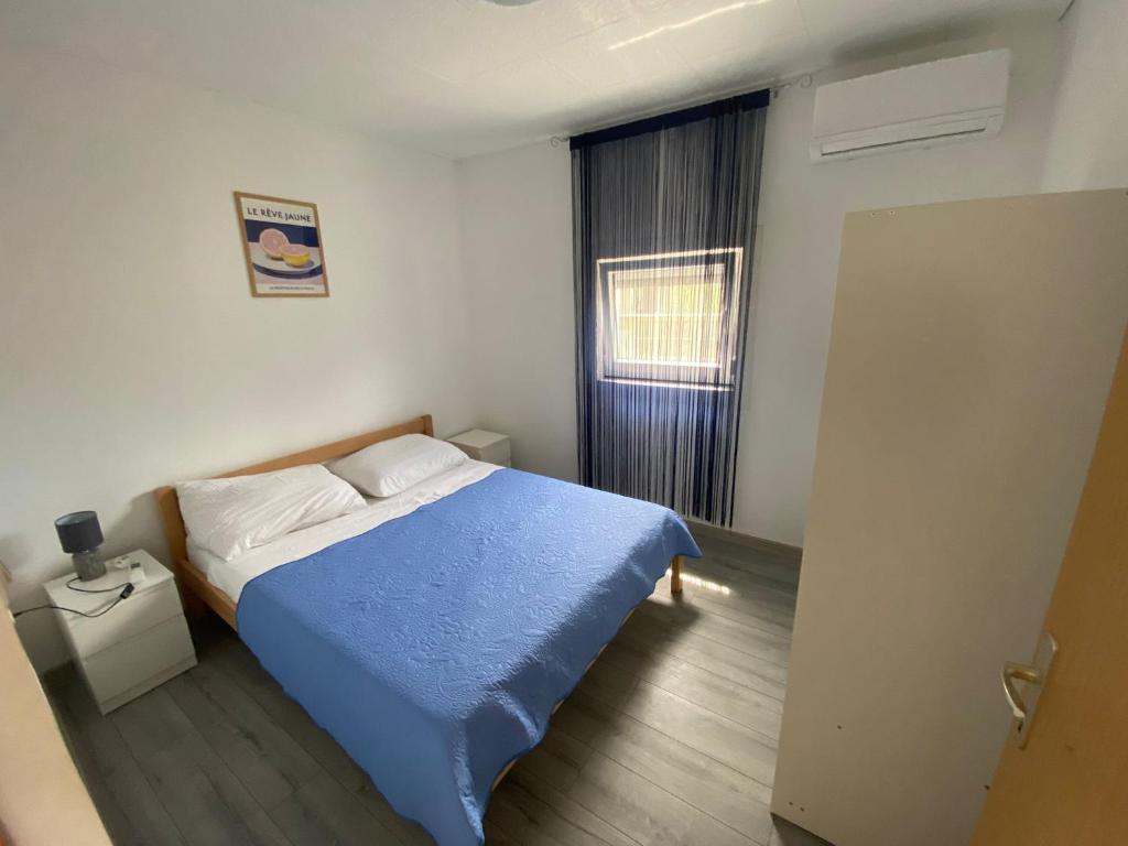 Postel nebo postele na pokoji v ubytování Apartment MiA with WIFi and private garden