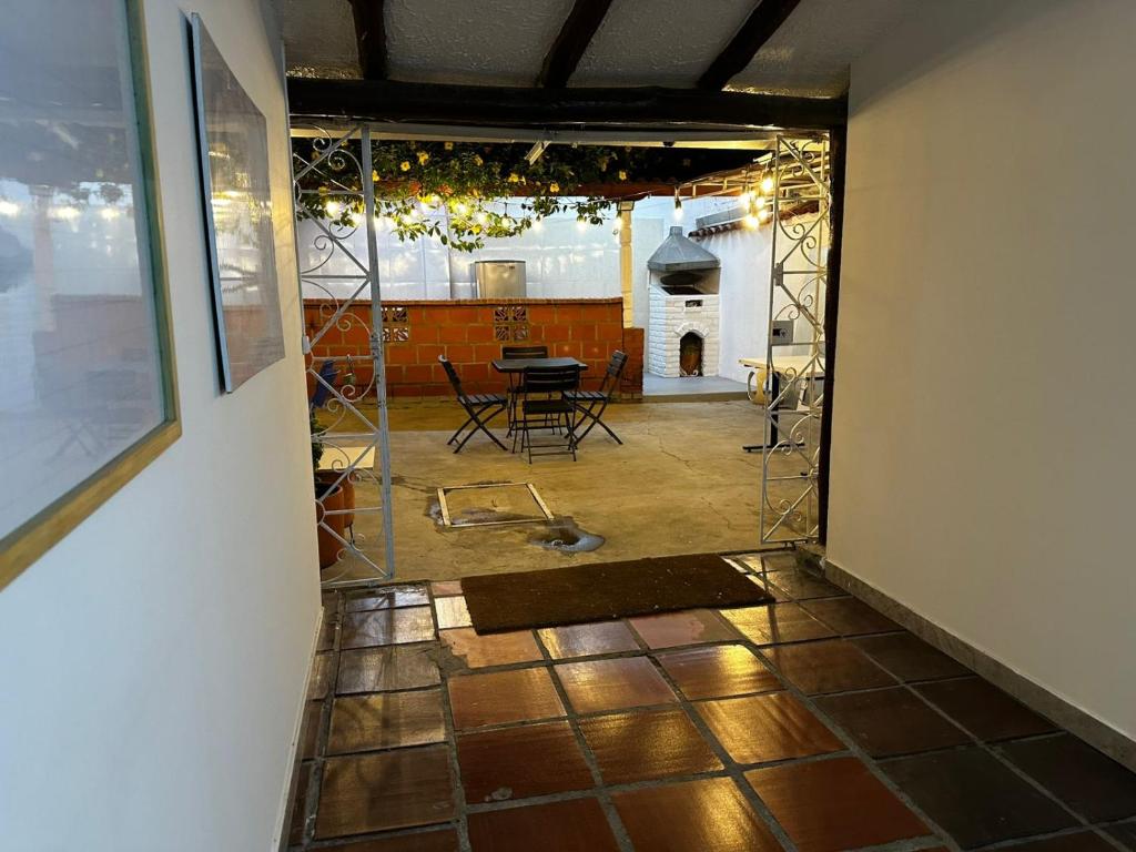 a view of a room with a table and chairs at Coliving habitacional in Cali