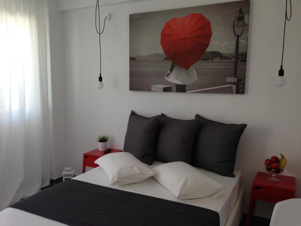 Łóżko lub łóżka w pokoju w obiekcie Philoxenia Suites