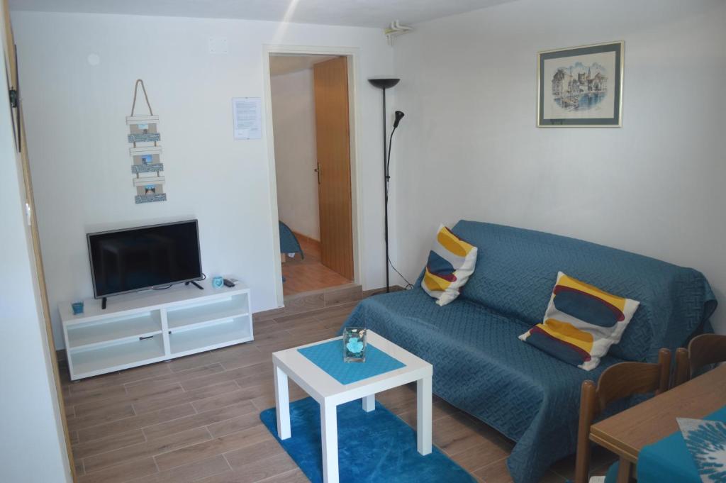 TV a/nebo společenská místnost v ubytování Apartments Marino Gojak