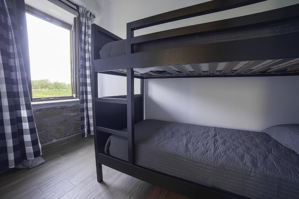 Postel nebo postele na pokoji v ubytování Agriturismo Sensi