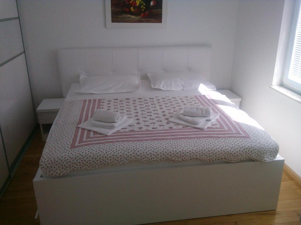 Postel nebo postele na pokoji v ubytování Apartment Marco