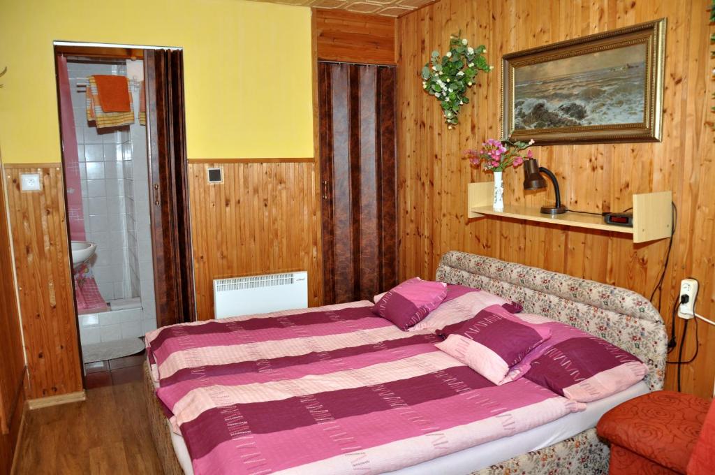 Postel nebo postele na pokoji v ubytování Pension Nika