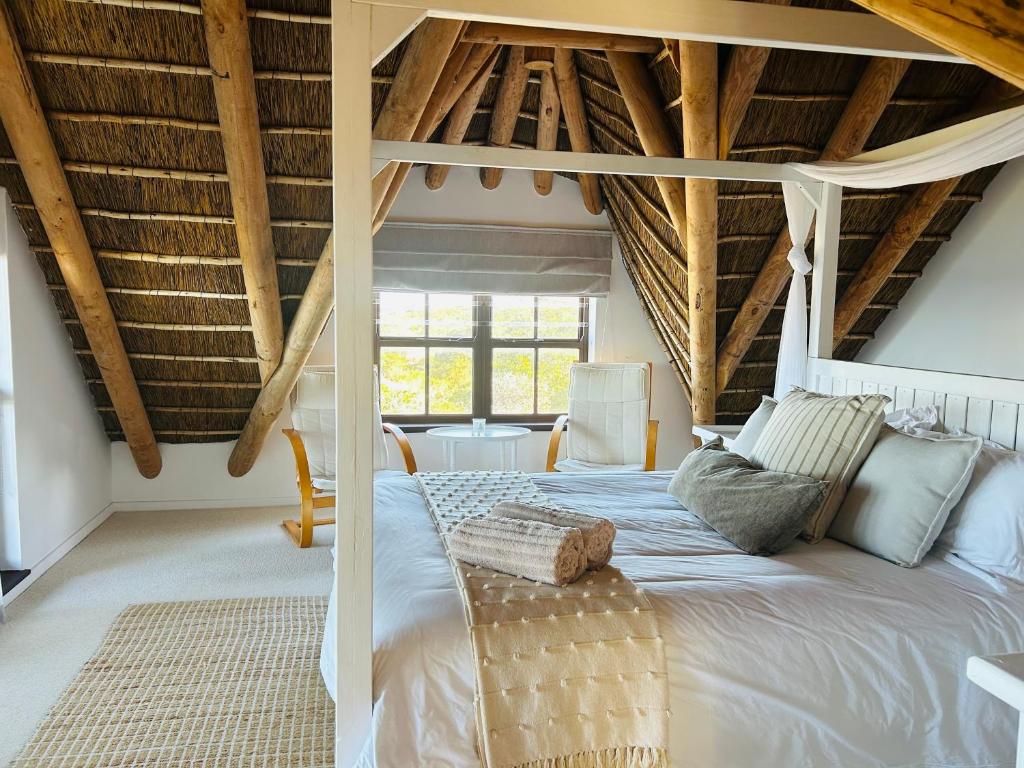 Postel nebo postele na pokoji v ubytování Quill Cottage