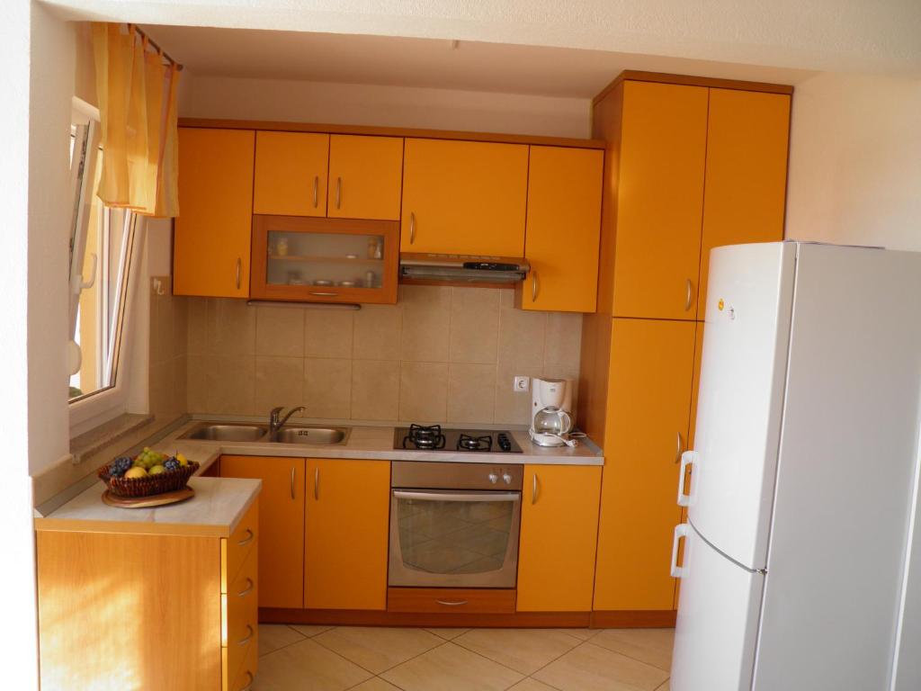 Kuchyň nebo kuchyňský kout v ubytování Guest House Davor Tomas