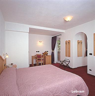 Postel nebo postele na pokoji v ubytování Hotel Vigo