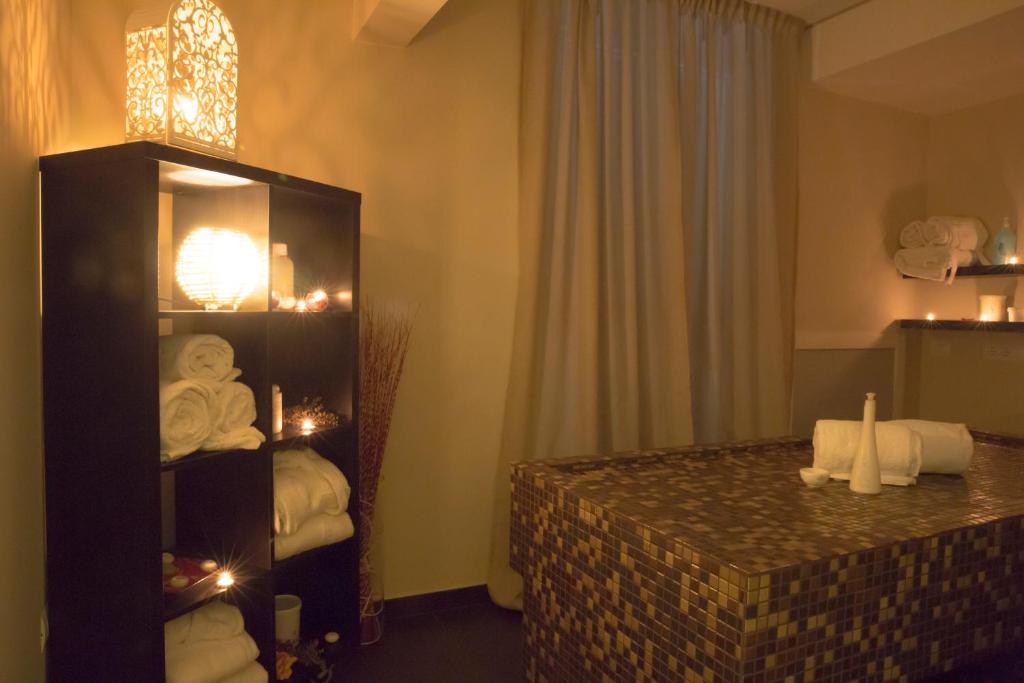 Postel nebo postele na pokoji v ubytování Hotel Degli Ulivi