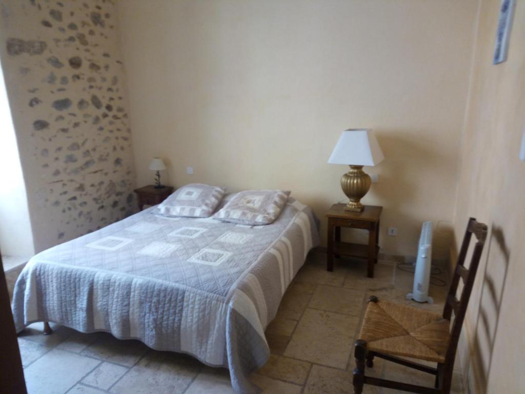 Postel nebo postele na pokoji v ubytování Hotel l'Oronge