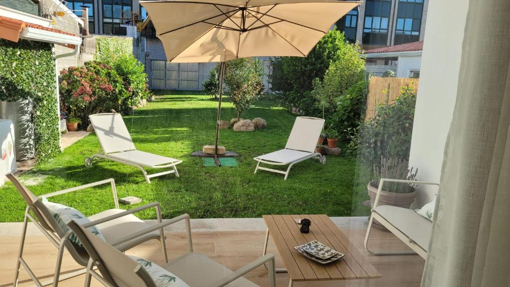 Κήπος έξω από το Egeria Casa Jardín