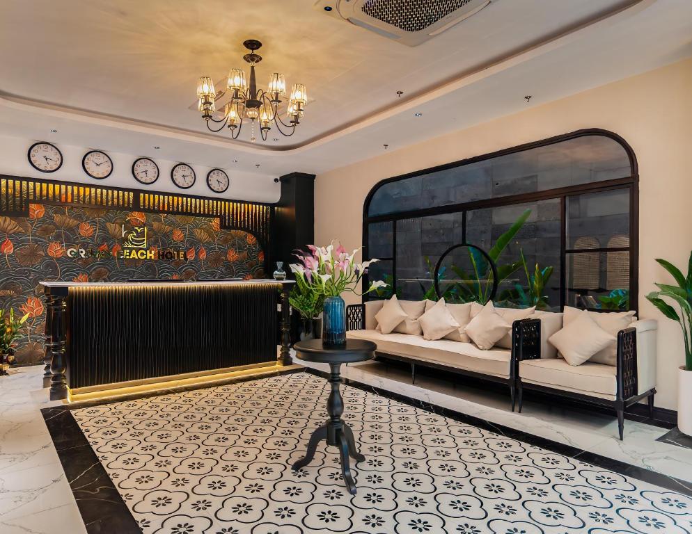 Et opholdsområde på Grand Beach Nha Trang hotel - 그랜드 비치 호텔 나트랑