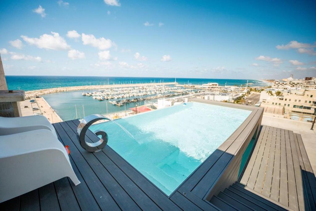 Πισίνα στο ή κοντά στο Shani house of style shunit penthouse