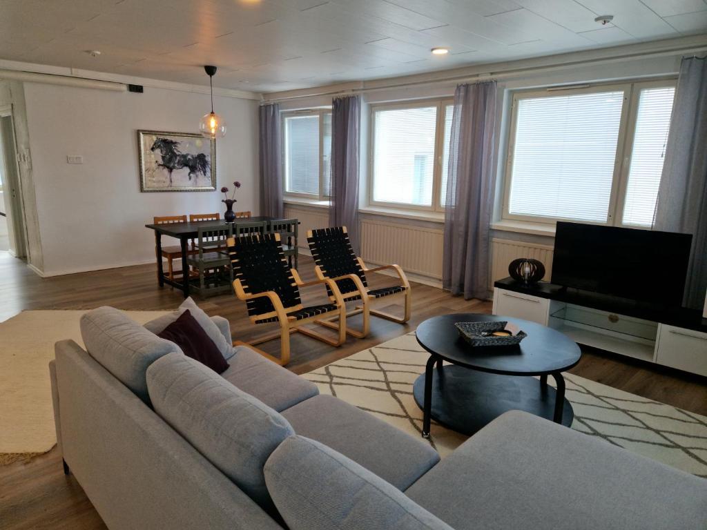 Μια τηλεόραση ή/και κέντρο ψυχαγωγίας στο Minna Canthin katu Apartment