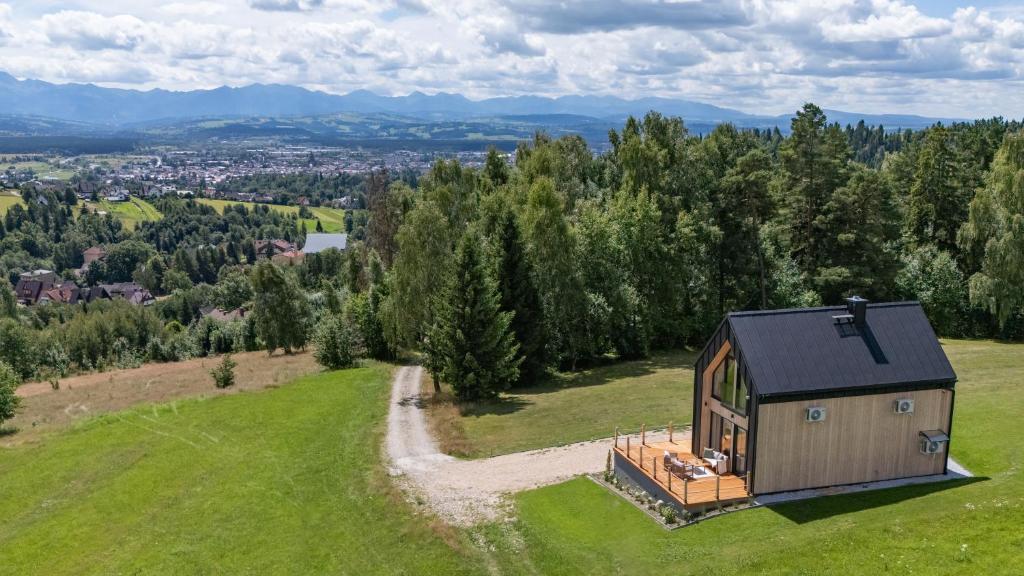 an overhead view of a tiny house on a hill at Wichrowy Domek in Nowy Targ